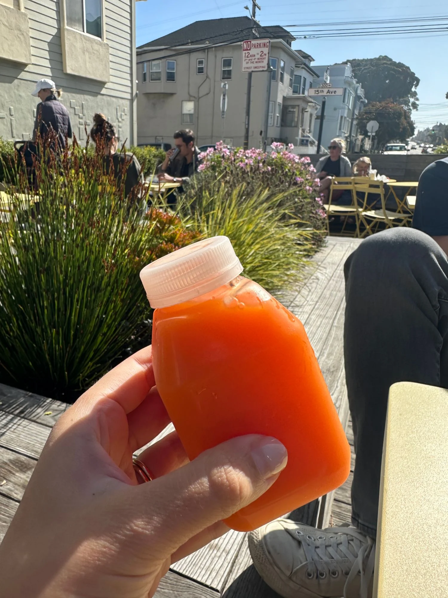 The carrot orange juice at Breadbelly on the sunny Clement Street patio