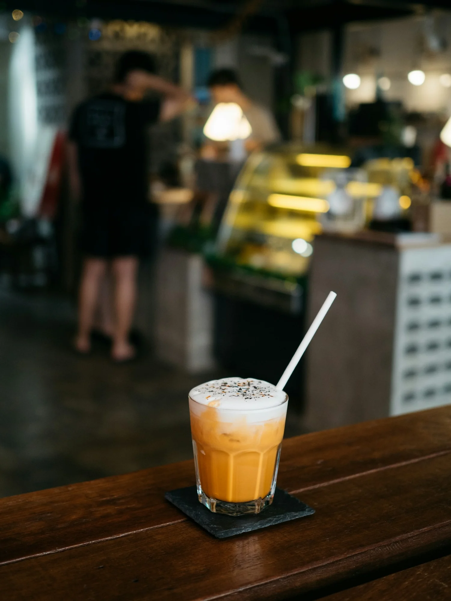 An orange Thai iced tea with a cream top like the one at My Father's Kitchen on Divisadero