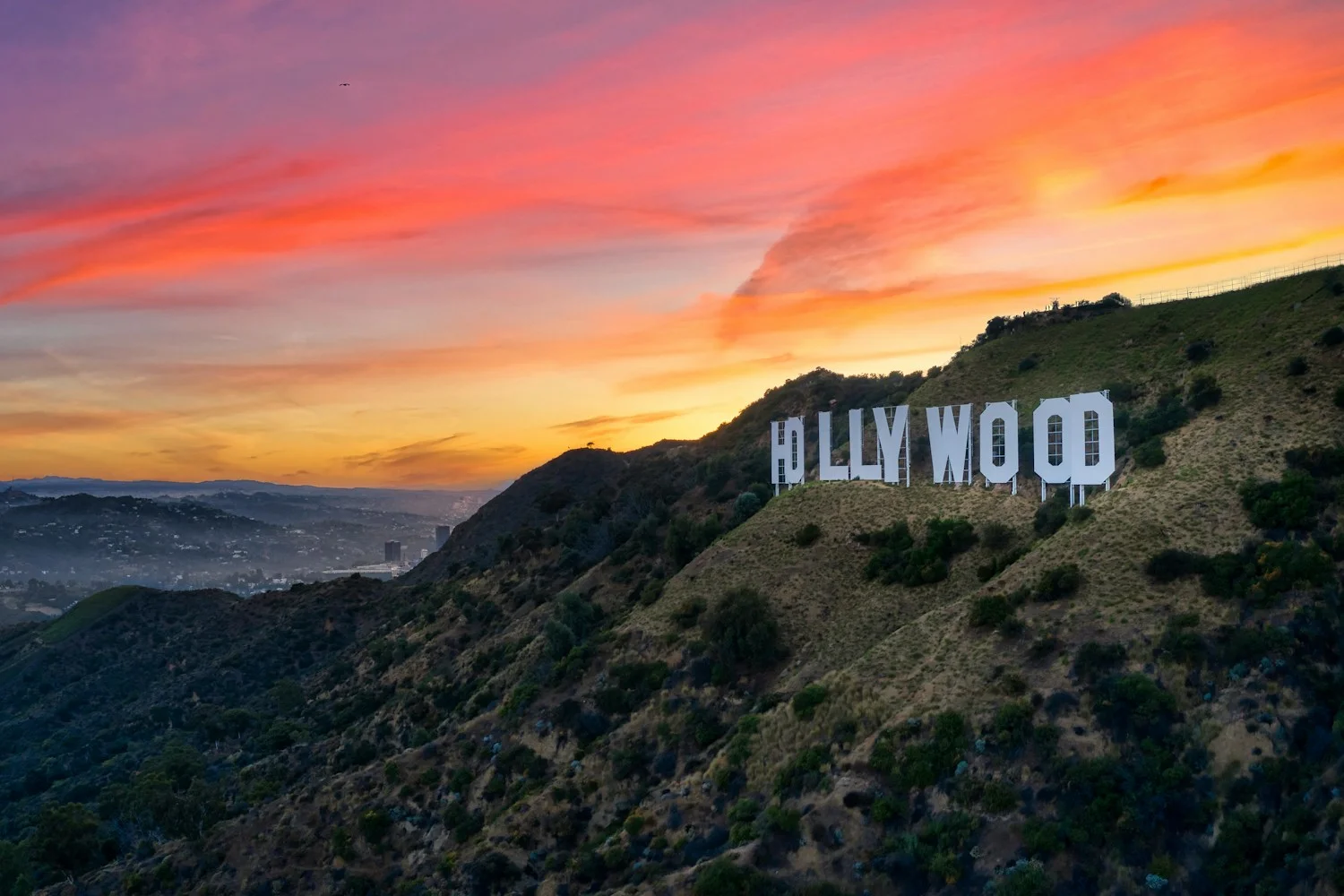 The Hollywood sign on its hillside above Los Angeles at sunset
