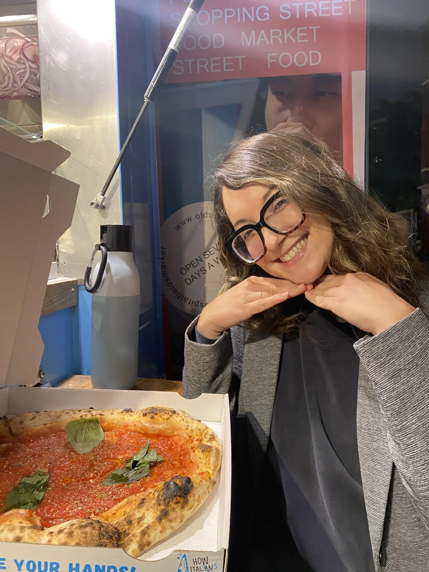 eating vegan pizza in London, England